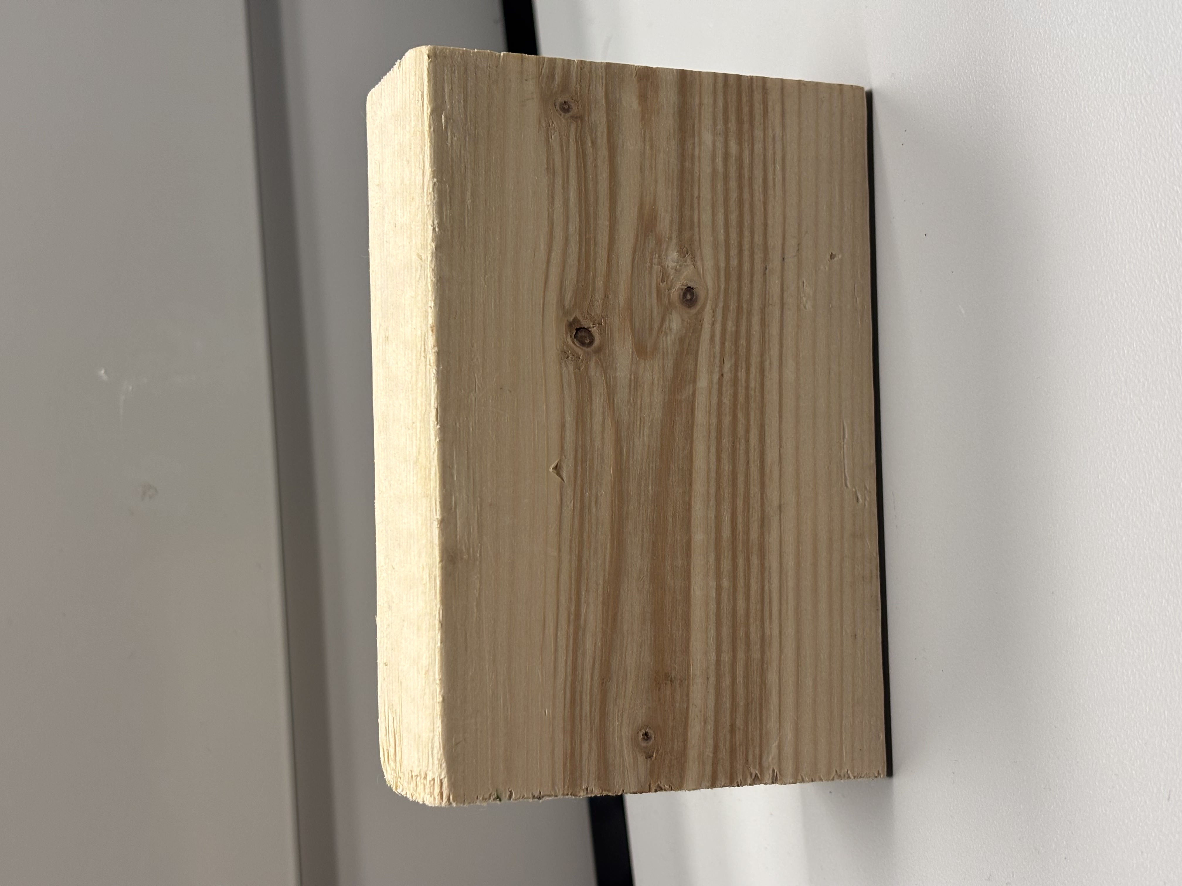 Wood: It has a refined material state, rigid material plasticity, and is used for furniture, decoration and tools. It has smooth edges but rough 'spilt' ends. Brown in colour.